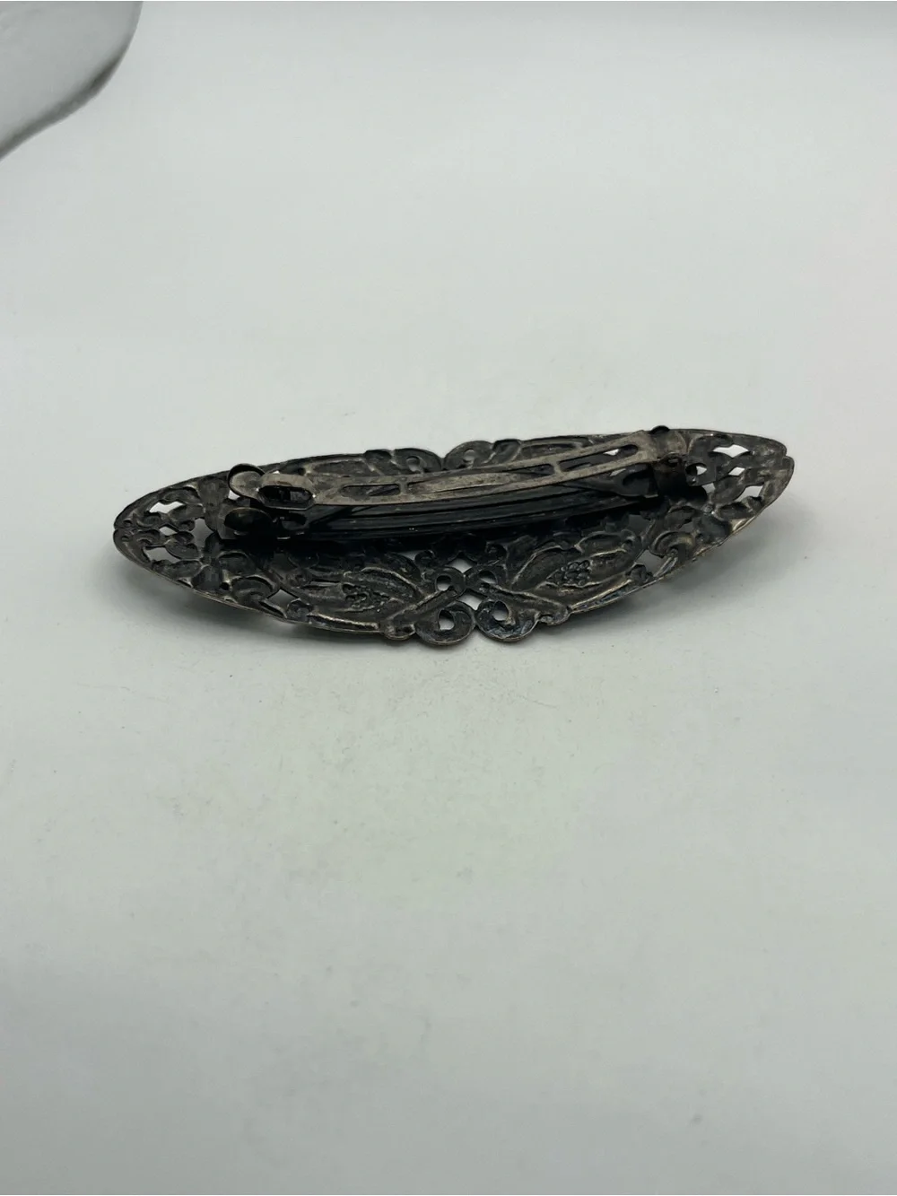 Art Nouveau style silver tone flower filigree oval hair clip barrette